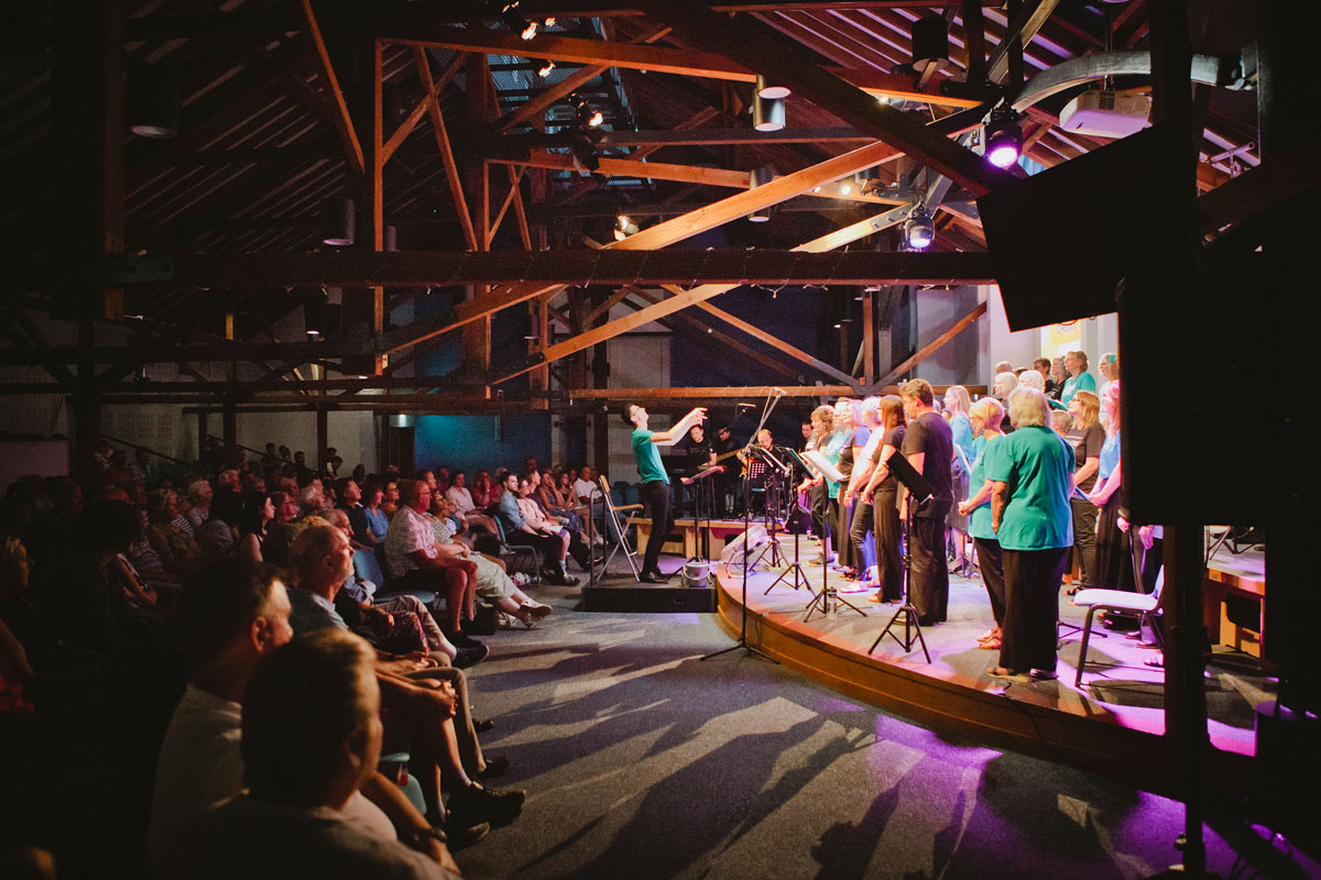 Encore Choir performing in front of an audience